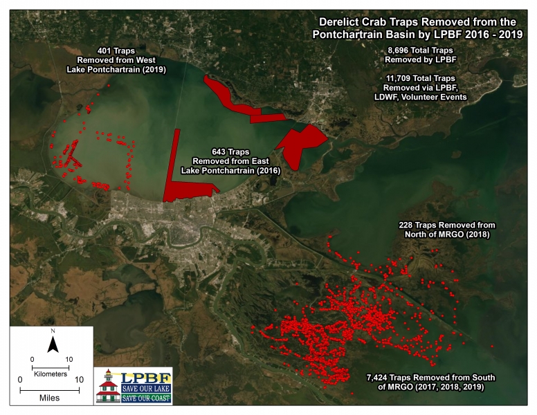 A Google Earth image of Lake Pontchartrain that is heavily dotted with red dots. Each dot represents where derelict crab pots were removed from the water.