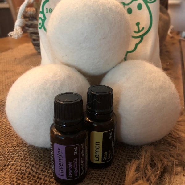 Wool dryer balls a bottles of essential oil.