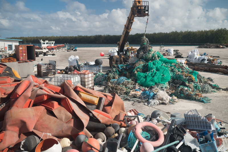 Sorting collected marine debris on Midway Atoll.