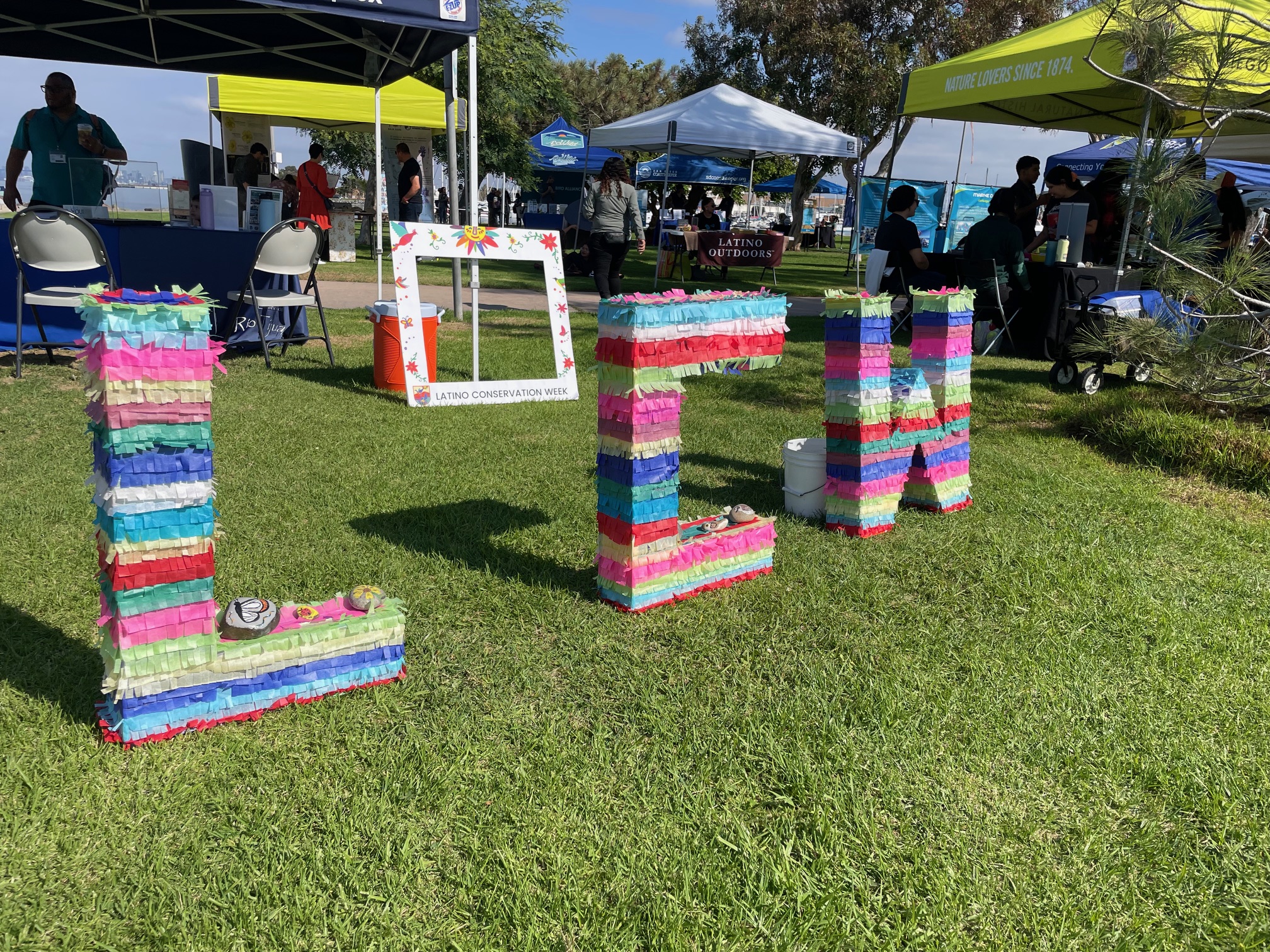 A set of colorful block letters that spell out LCW.