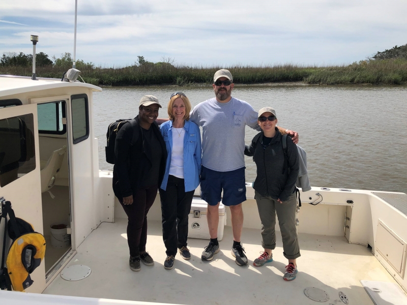 Georgia Department of Natural Resources' staff and NOAA team members on a boat.