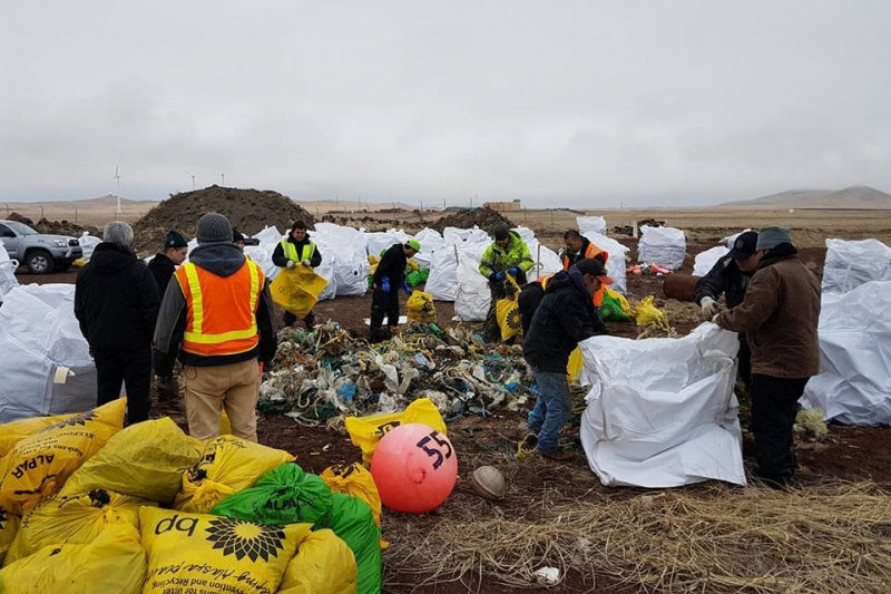 A debris removal team sorts through the collected debris.