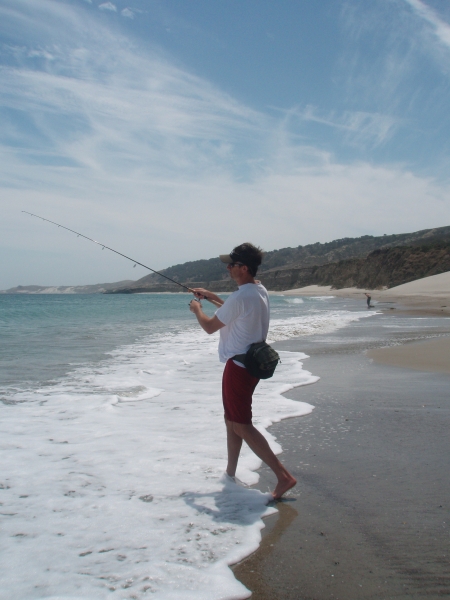 Man surf fishing.