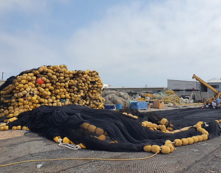 Several massive piles of retired fishing gear.
