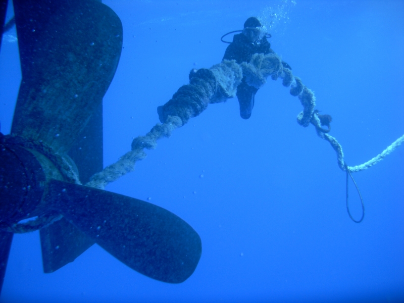 Large net caught on a boat propeller.