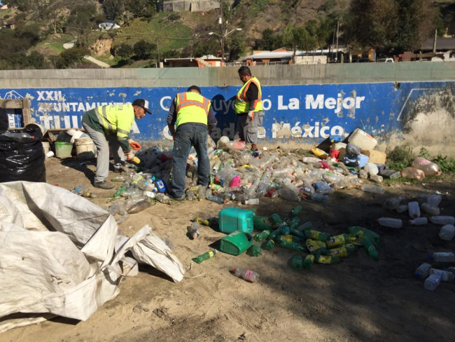 People sorting debris. 