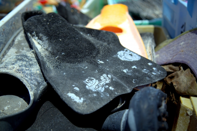 Swim fins collected by the removal team.