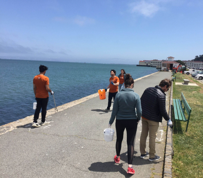 Volunteers cleaning up cigarette litter. 