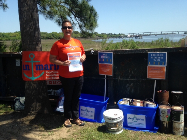 A Clean Marine volunteer helps collect items for disposal or recycling near Charleston, SC.