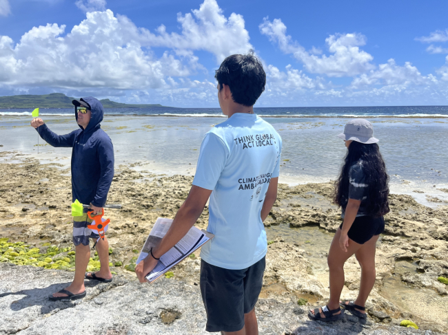 A team setting up a shoreline survey to monitor marine debris.
