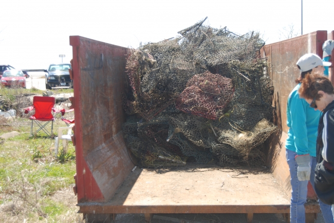 A truck bed full of derelict crab pots.