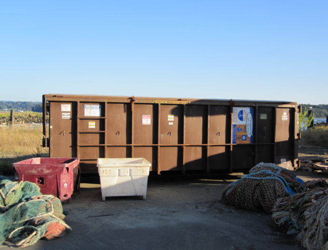 A large, dumpster-like bin.