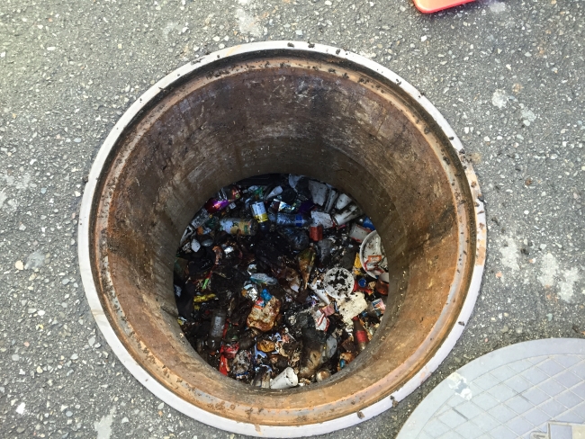 An underground Continuous Deflection Separator with trash in it.