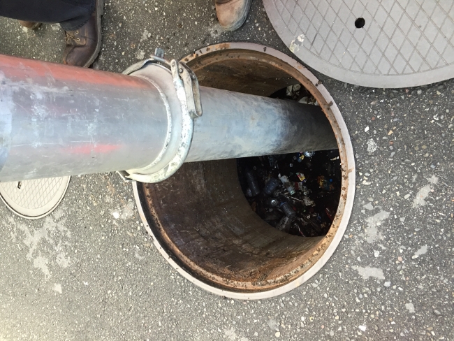 The trash in the CDS is removed by a vacuum truck. (Photo Credit: NOAA)