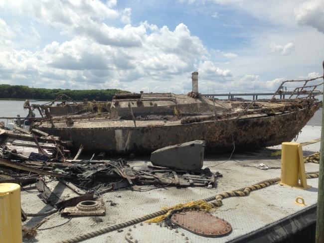 A deteriorating sailboat.