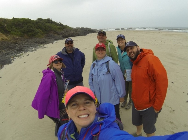 A group of people on a beach.