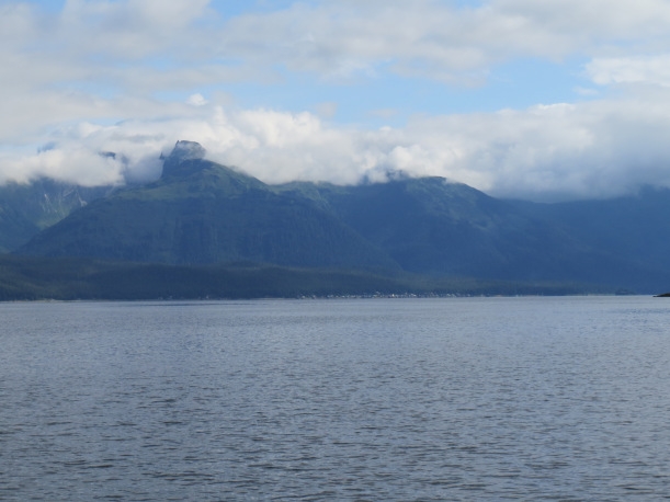 Image of mountains by the water.