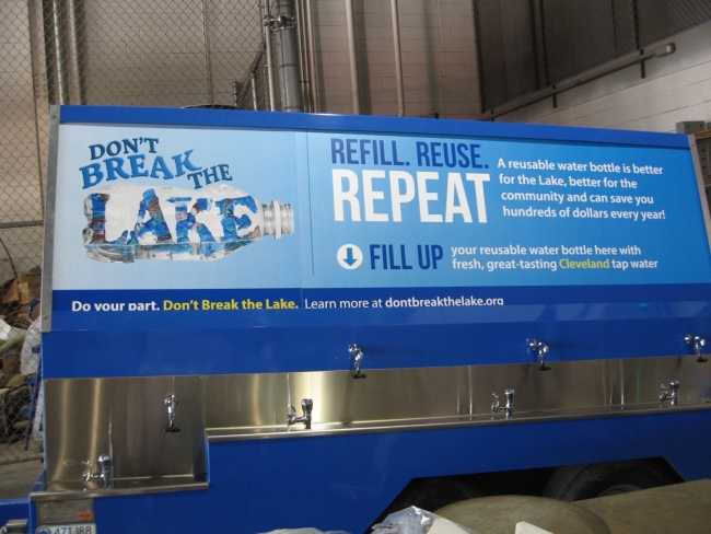 A water station reading "Don't Break the Lake".