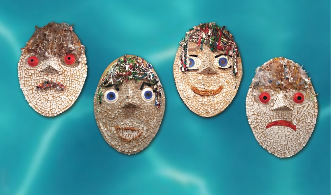Four masks made of marine debris.