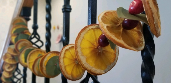 Dried oranges strung together to create a garland.