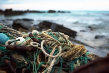 Derelict nets and ropes on a beach.
