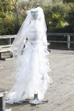 Creepy dress made out of plastic bags. 