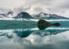 A reflective bay within Katmai National Park in Alaska. 