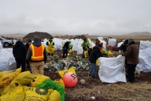 A debris removal team sorts through the collected debris.