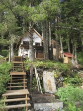 A newly-constructed cabin using marine debris materials.