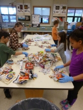 Students sort waste.