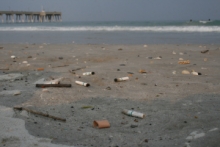 Cigarette butts on a beach.