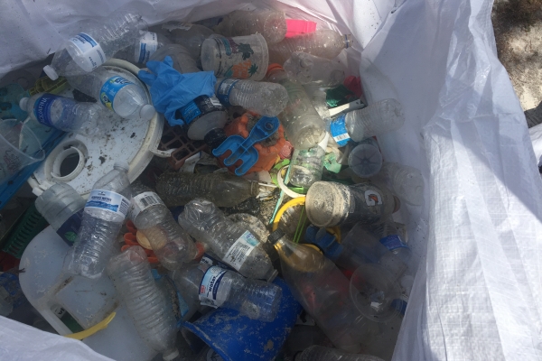 A bag full of water bottles.