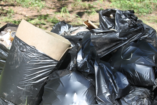 Garbage bags full of trash.