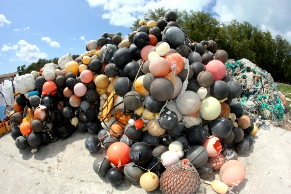 A large pile of hard plastic buoys (4,178) and foam buoys (1,467).