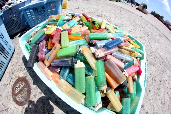 A bucket of lighters.